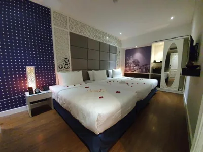 Chambre triple Deluxe — Victor Metropolis Hotel & Rooftop Bar